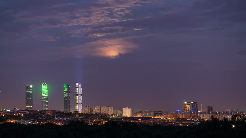 Moonrise behind the four tower in Madrid
