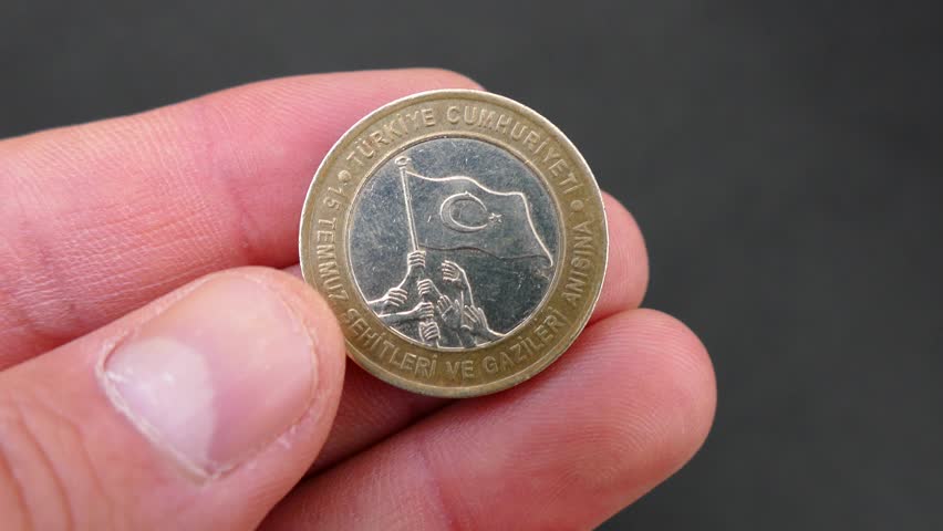 republic of turkey in the hands of a human, coin issued for July 15,