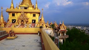 4K video of golden pagoda in Khiri Wong temple, Thailand.