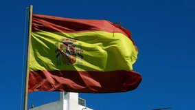 Spanish flag in a stiff breeze in San Miguel at Quarter speed