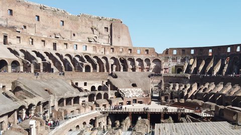 ROME,ITALY- MARCH 29::Dolly Shot of Unidentified Tourist Walk inside Colosseum in Rome  on March 29,2019