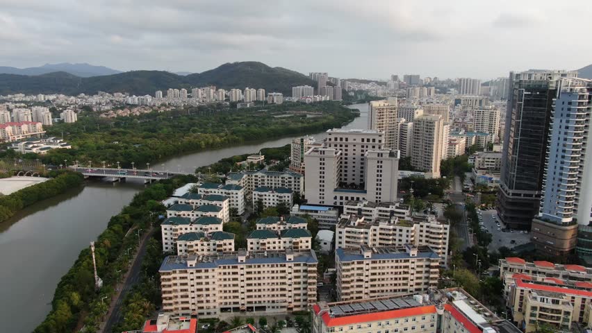Flying over the city, wine city from a height, Hainan Island, Sanya, China, landscape, resort.