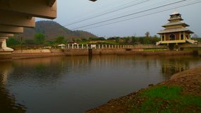 4K video of Thachompoo bridge or white bridge with country view in Lamphun province, Thailand.