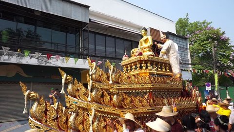 Chiang Mai, Thailand - April 13, 2019: procession of the Buddha Phra Singh and other buddha bmages during Chiang Mai Songkran Festival 2019