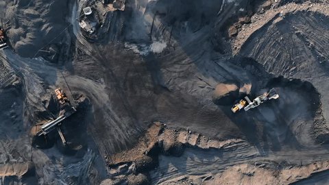 Open pit mine, extractive industry for coal, top view aerial drone.