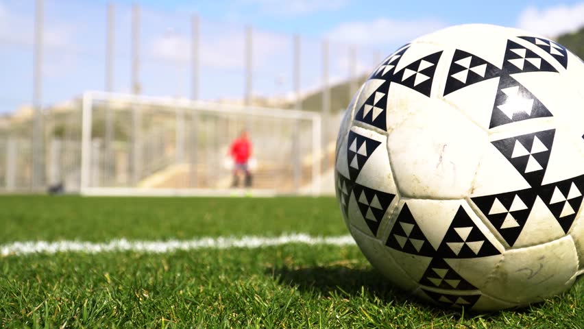 goal keeper practice an a soccer field