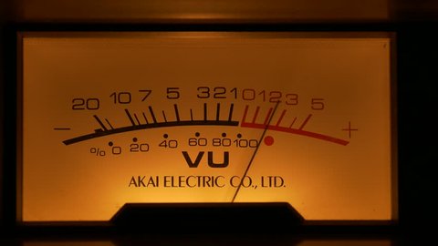 Minsk, Belarus - Jul 14, 2018 (Ungraded): Analog VU meters on classic hi-fi Akai GX-635D reel-to-reel tape recorder displaying sound levels with arrow moving in sync to music.