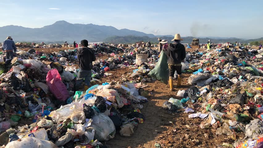 KOTA KINABALU, MALAYSIA - 13 APRIL, 2019: The view of landfill site at Kayu Madang, Kota Kinabalu, Sabah.Malaysia. | Shutterstock HD Video #1027533335