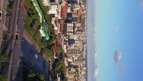 Vertical video. Russia, Ekaterinburg - June 7, 2018: Embankment of the central pond and Plotinka. The historic center of the city of Yekaterinburg, From Drone