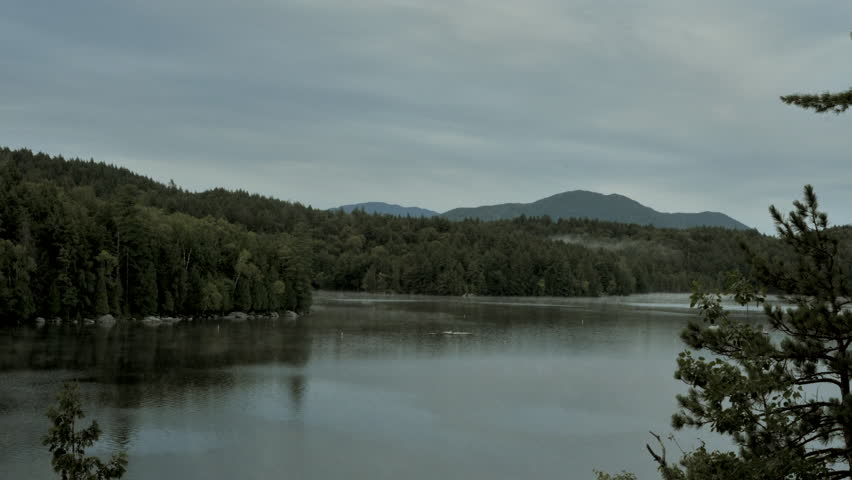 This is a Time Lapse of Saranac Lake in upstate New York. You can see the morning fog roll over the lake as the clouds rush by in the distance.