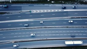 transportation in big city, aerial top down view 4K video of cars on busy highway motorway	