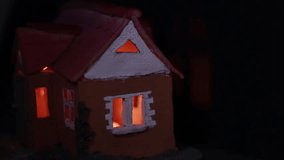 Passing Car Lights On The Ceramic House In The Dark.