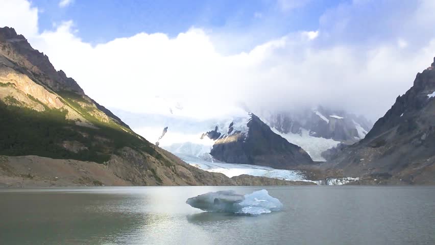 Cerro torre and iceberg in Torre laggon in Patagonia, Argentina. Cerro torre and iceberg in Torre laggon in Patagonia, Argentina. Travel and adventure concept.