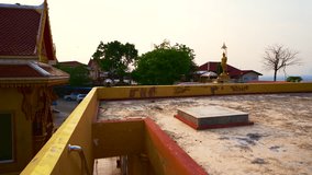 4K video of golden pagoda in Khiri Wong temple, Thailand.