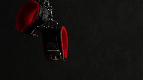 Set of erotic toys for BDSM. The game of sexual slavery with handcuffed with chains. Intimate sex games