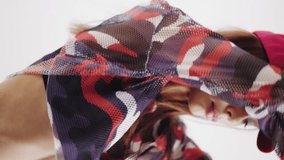 Fashion theme dancing girl  beautifully moving showing off clothes. Vertical video - Powered by Shutterstock - Get 15% off with code: PIKWIZARD15