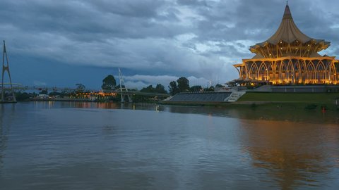 Sunset At Kuching Waterfront With Sarawak's State Legislative Assembly Building in the Background. Camera Pan Right