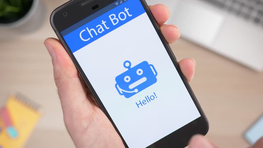 Chatbot app on a smartphone being used to answer a user question. Royalty-Free Stock Footage #1027633805