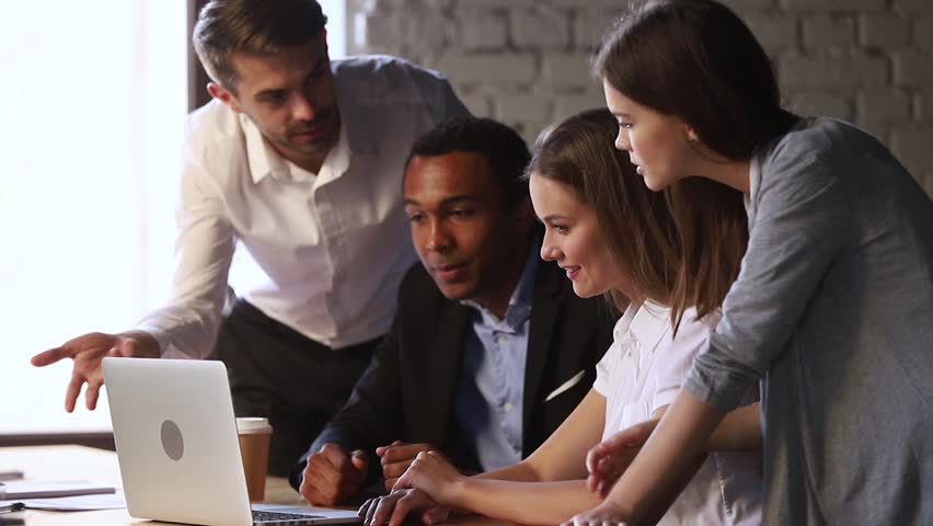 African american mentor leader coach teaching team employees explaining online project training diverse corporate group with laptop computer talking involved in brainstorm teamwork at office meeting  Royalty-Free Stock Footage #1027633976