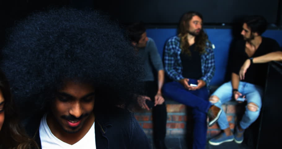 Front view close up of smiling diverse couple taking a selfie.