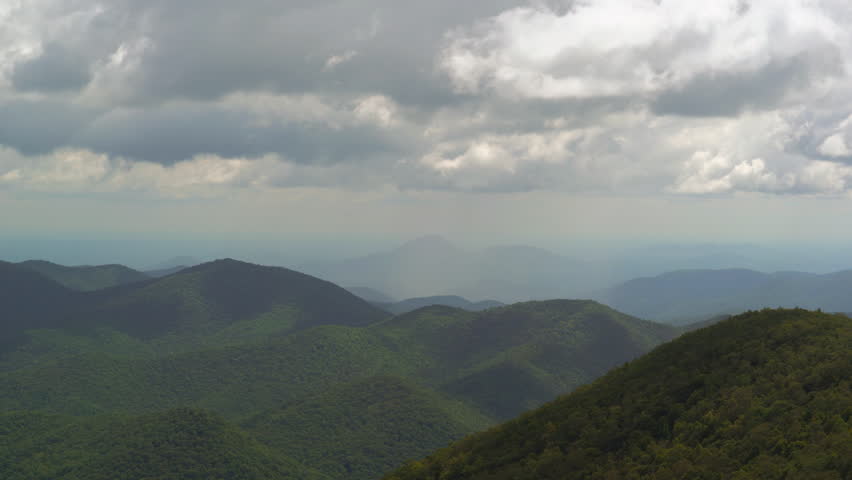 The vast Appalachian mountain ranges, with embedded rain showers, from the Brasstown Bald visitors center in Georgia.