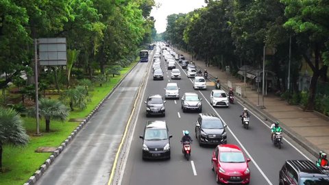Jakarta, Indonesia - May 17, 2018: TransJakarta Busway on Medan Merdeka Barat Street during rush hour