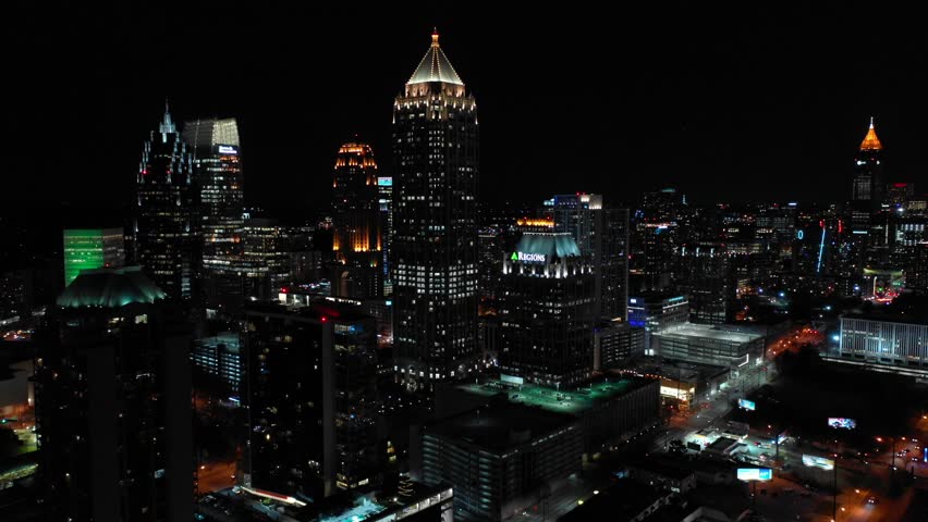 ATLANTA, GA, USA - MARCH 15, 2019: Skyscrapers of Atlanta Georgia night footage aerial 4k