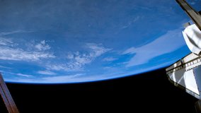 Beautiful time lapse of over the Earth from International Space Station with a spaceship park behind a dusty window. Earth maps and images courtesy by Nasa.