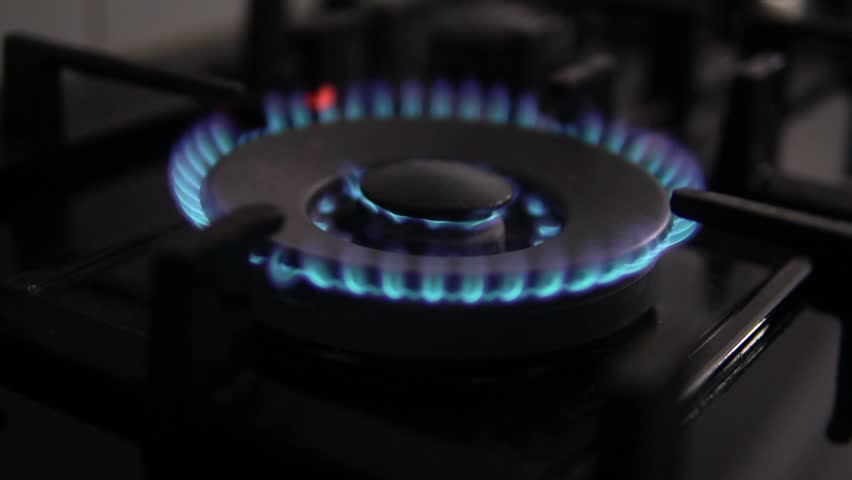 Gas burner in the kitchen - low motion | Shutterstock HD Video #1027658960