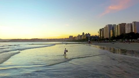 Drone shot Santos Brazil beach shoreside showing buldings 
