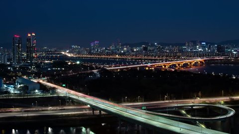 The night view of Seoul. Time lapse expressway top view.