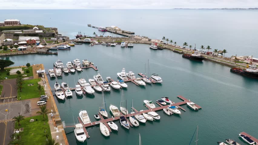 Aerial view of harbour with boats on tropical island. MOVING FORWARD.