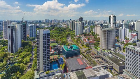 Tanjong Pagar, Singapore - April 7, 2019: Footage 4k Timelapse, Aerial view of cityscape skyline on Orchard Road, Traffic day time with amaizing cloud moving as background, the epicentre of shopping.