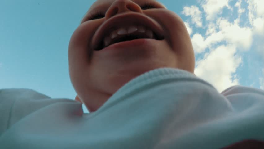 Father hands throw up little cute smiling son playing together clear blue sky in background POV shot happy family having fun outdoor relaxing at summer sunny day low angle Royalty-Free Stock Footage #1027693961