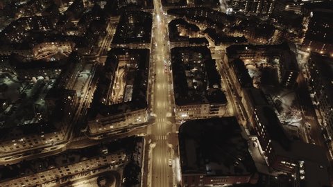 4K aerial hyperlapse with forward motion and a high angle view of nighttime traffic in downtown Oslo, Norway.