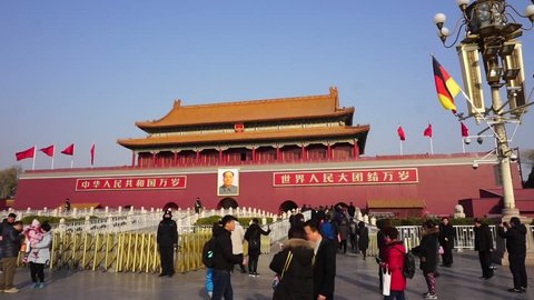 Beijing, China - December 9, 2018: People walking around Tiananmen Square