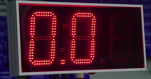 Big sports scoreboard timer, red led flashing numbers stopwatch.