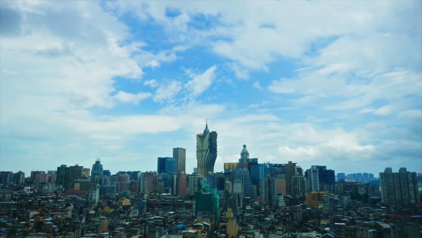Time lapse of clouds passing over the Grand Lisboa, and the skyline of Macau, China