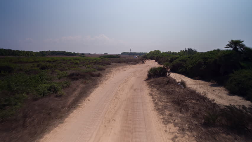 POV shot from a camera attached to the front of an off road vehicle driving through beautiful trails and paths in sardinia | Shutterstock HD Video #1027731293