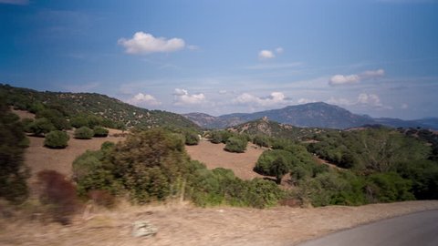 POV shot from a camera attached to the front of an off road vehicle driving in sardinia