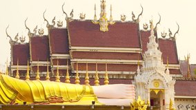 4K video of reclining Buddha in Phra That Suthon Mongkhon Khiri temple, Thailand.