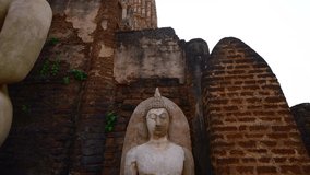 4K video of ancient Buddha statue in Phra Si Ratana Mahathat Chaliang temple, Thailand.