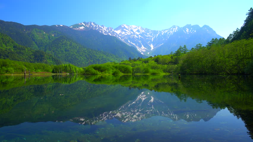 Hotaka mountain range reflect on Tashiro-ike Pond /kamikochi,Nagano Japan	
 Royalty-Free Stock Footage #1027751864