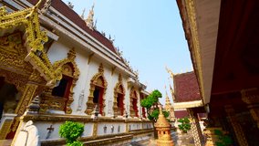 4K video of old pagoda with Buddhist church in Phra That Suthon Mongkhon Khiri temple, Thailand.