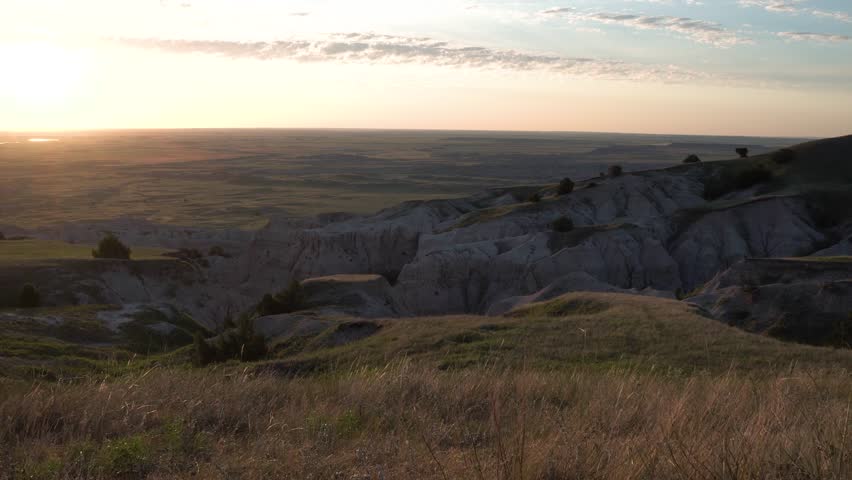 Green grass to the sunset at Badlands National Park, South Dakota
