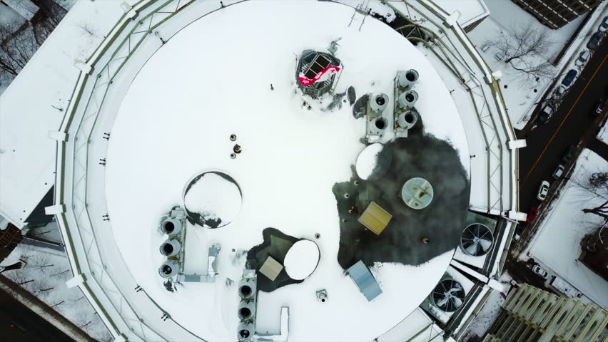 Cinematic drone - aerial footage moving backwards seen from Mont Royal showcasing McGill