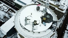 Cinematic static drone / aerial footage seen from Mont Royal showcasing McGill's university campus in Montreal, Quebec, Canada during winter season.