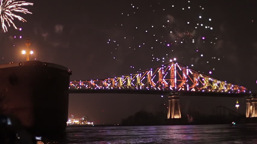 Light and fireworks show at Jacques Cartier bridge in Montreal, Quebec, Canada during summer season - night time.