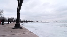 Time lapse footage of a frozen lake near Chambly canal, Quebec, Canada during winter season.