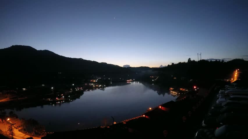 The steam floats on the morning pond.